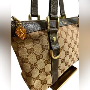 GUCCI - Authentic GG zippered canvas tote with leather trim/handles!!